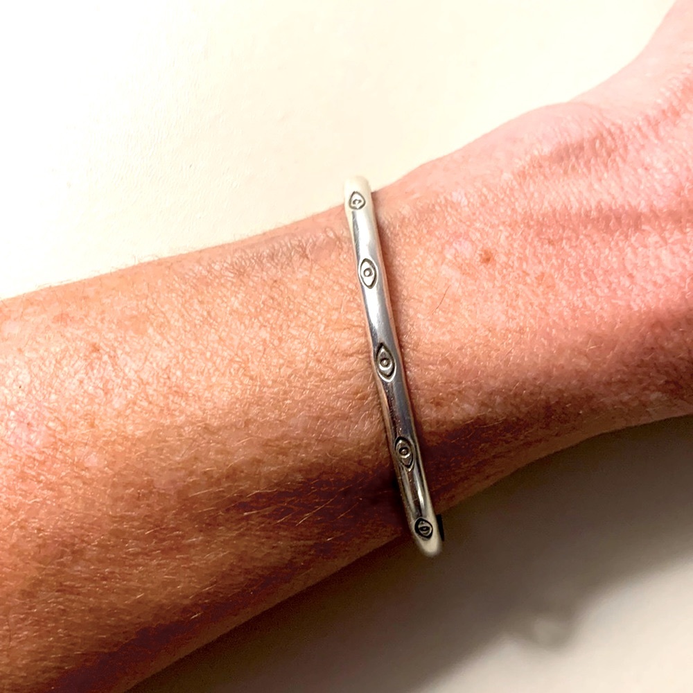 Sterling silver “seeing eye” cuff